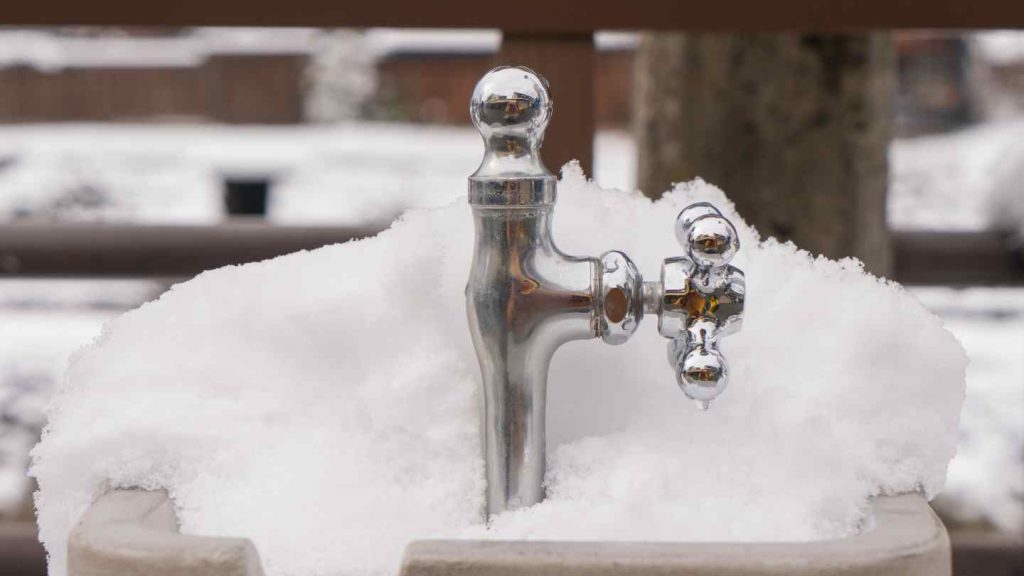 5 Best Ways to Protect Your Outdoor Faucets From Freezing - heat lamp - outdoor faucet